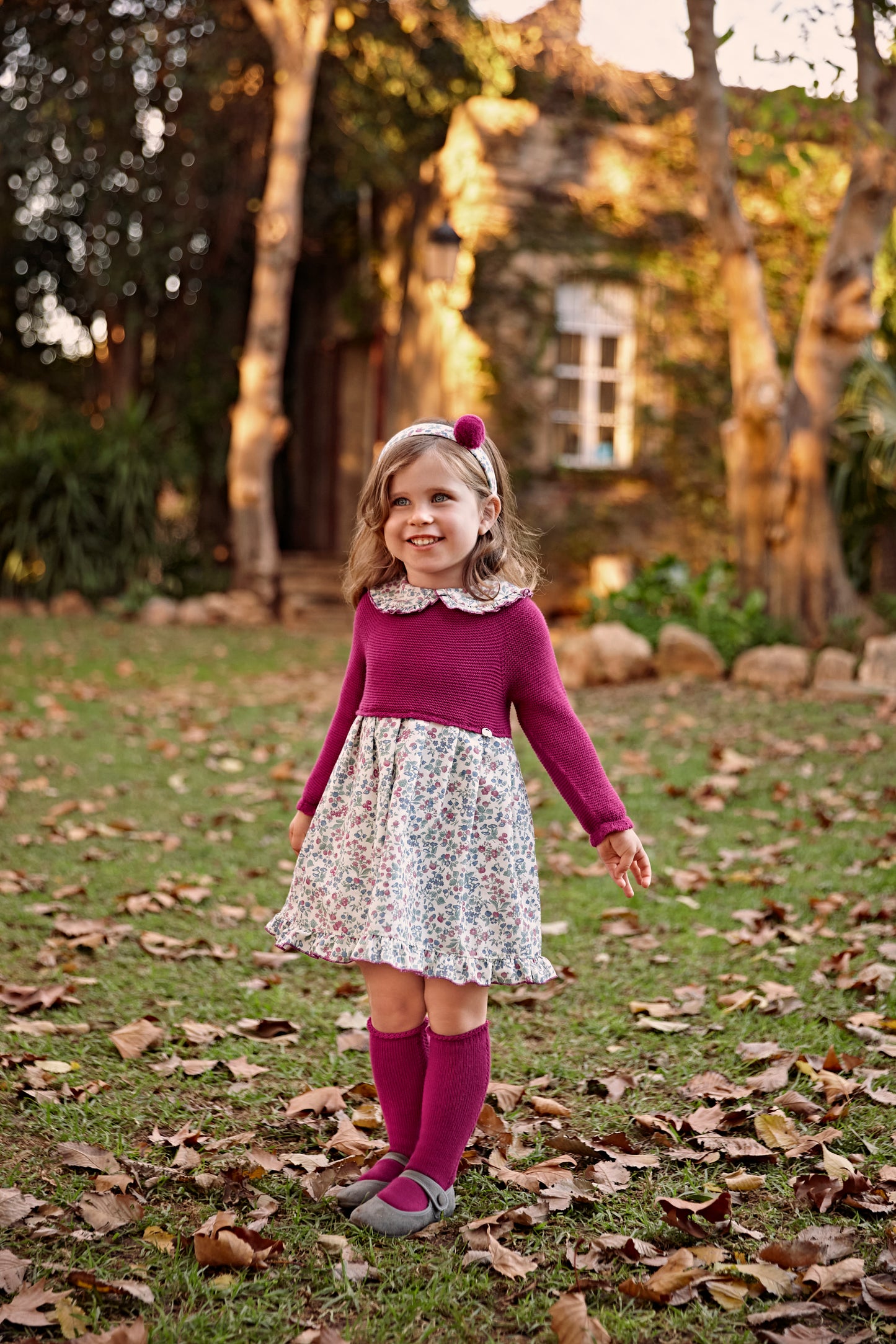 Vestido de punto fucsia y estampado de flores