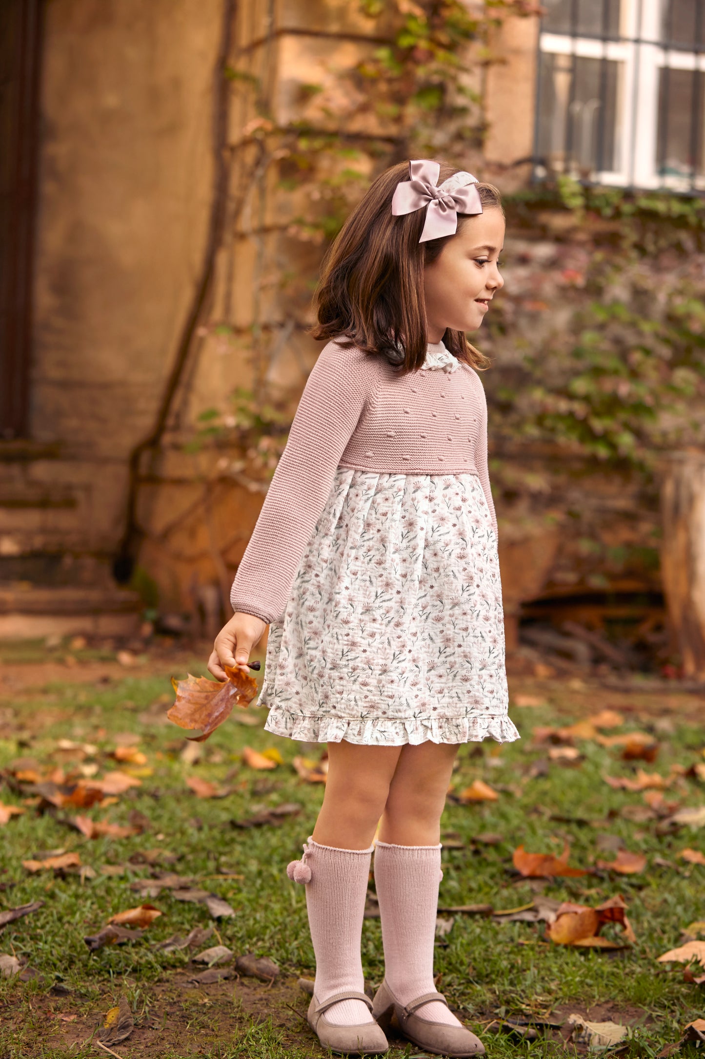 Vestido de punto rosa empolvado y bodoques