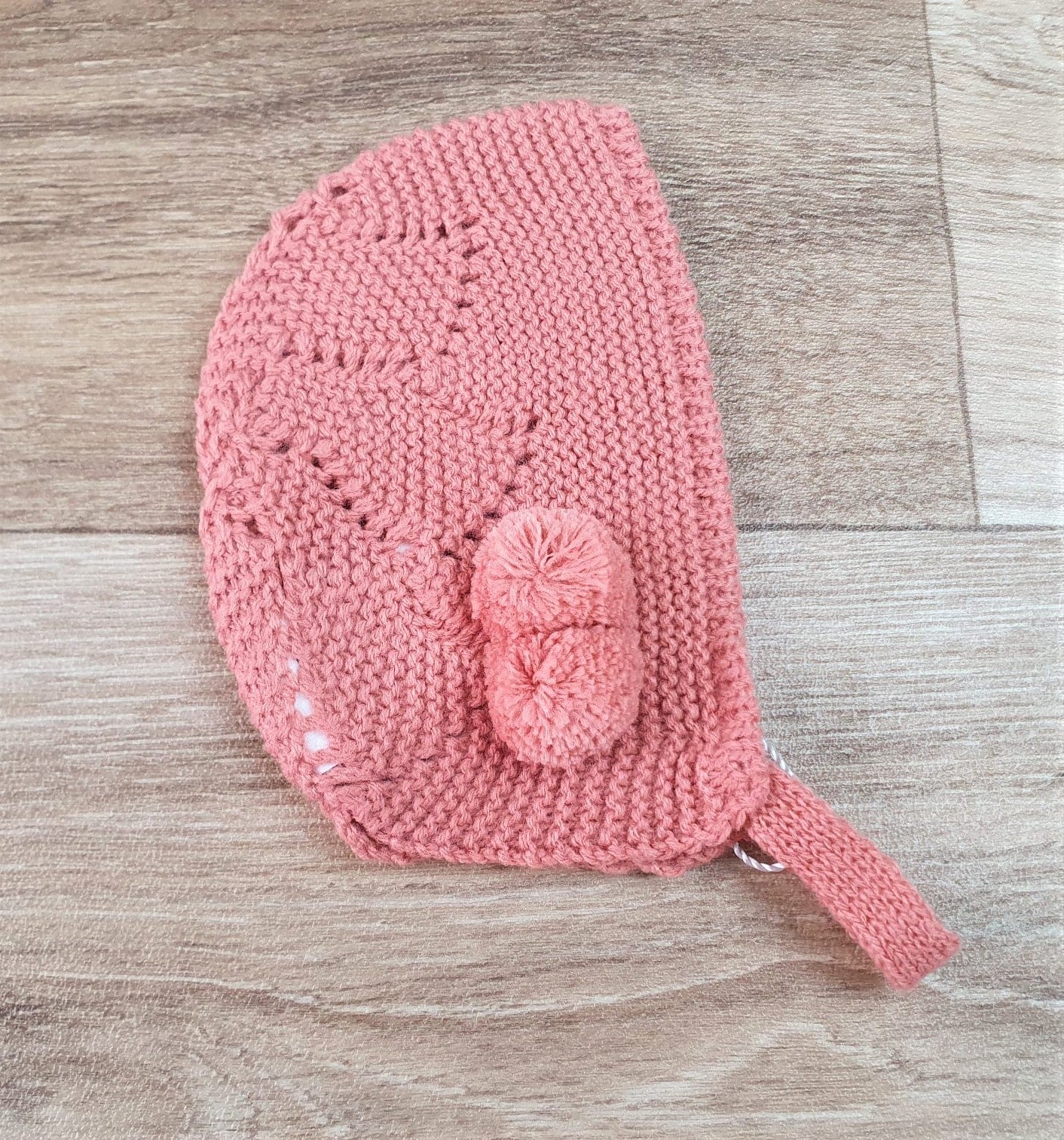 Capota bebe pompón