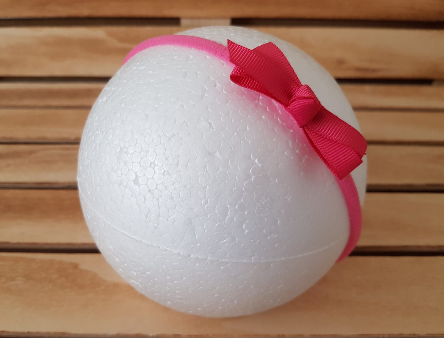 Cinta bebé lazo pequeño con punta Grosgrain