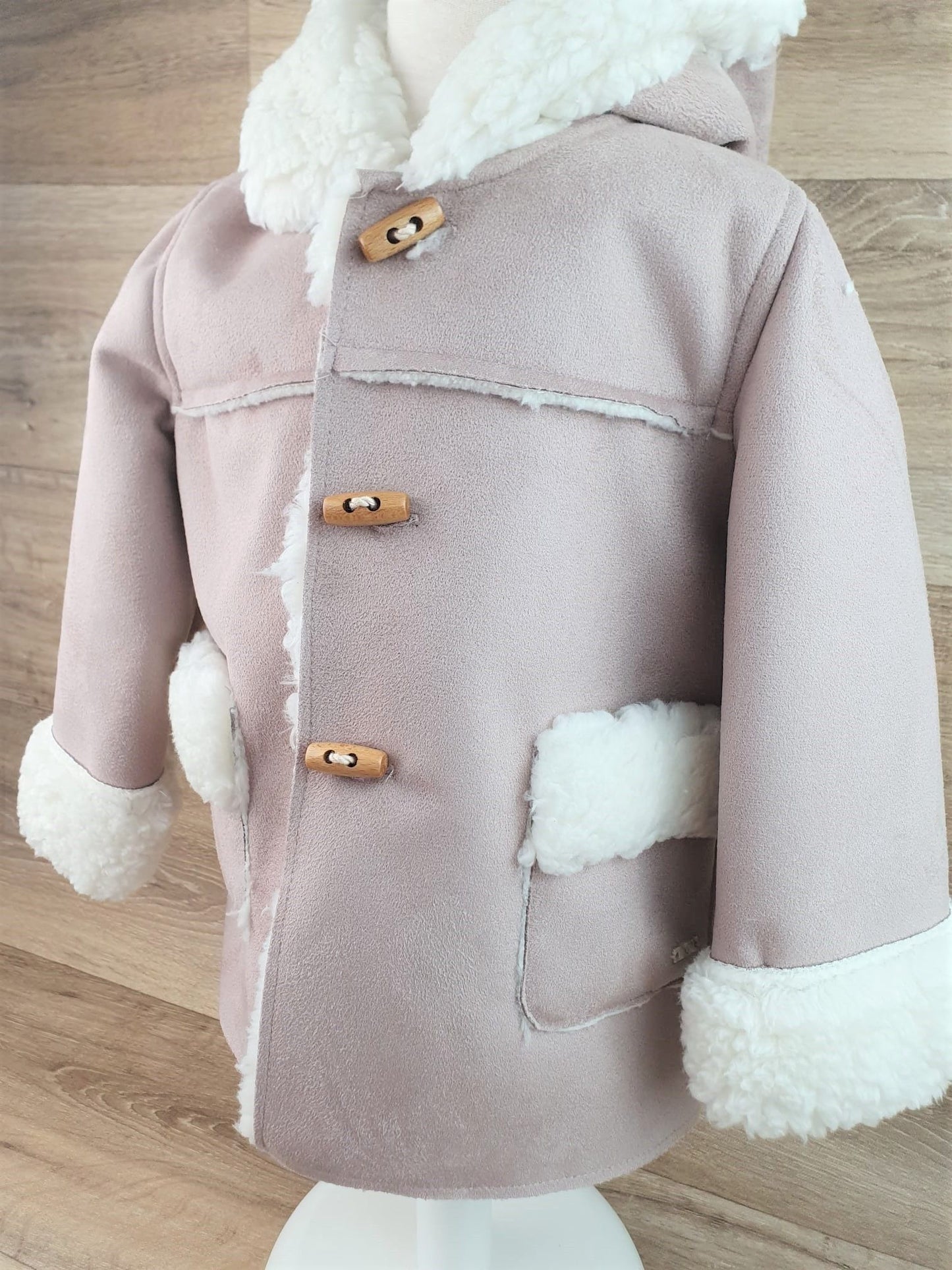 Abrigo bebé con capucha unisex