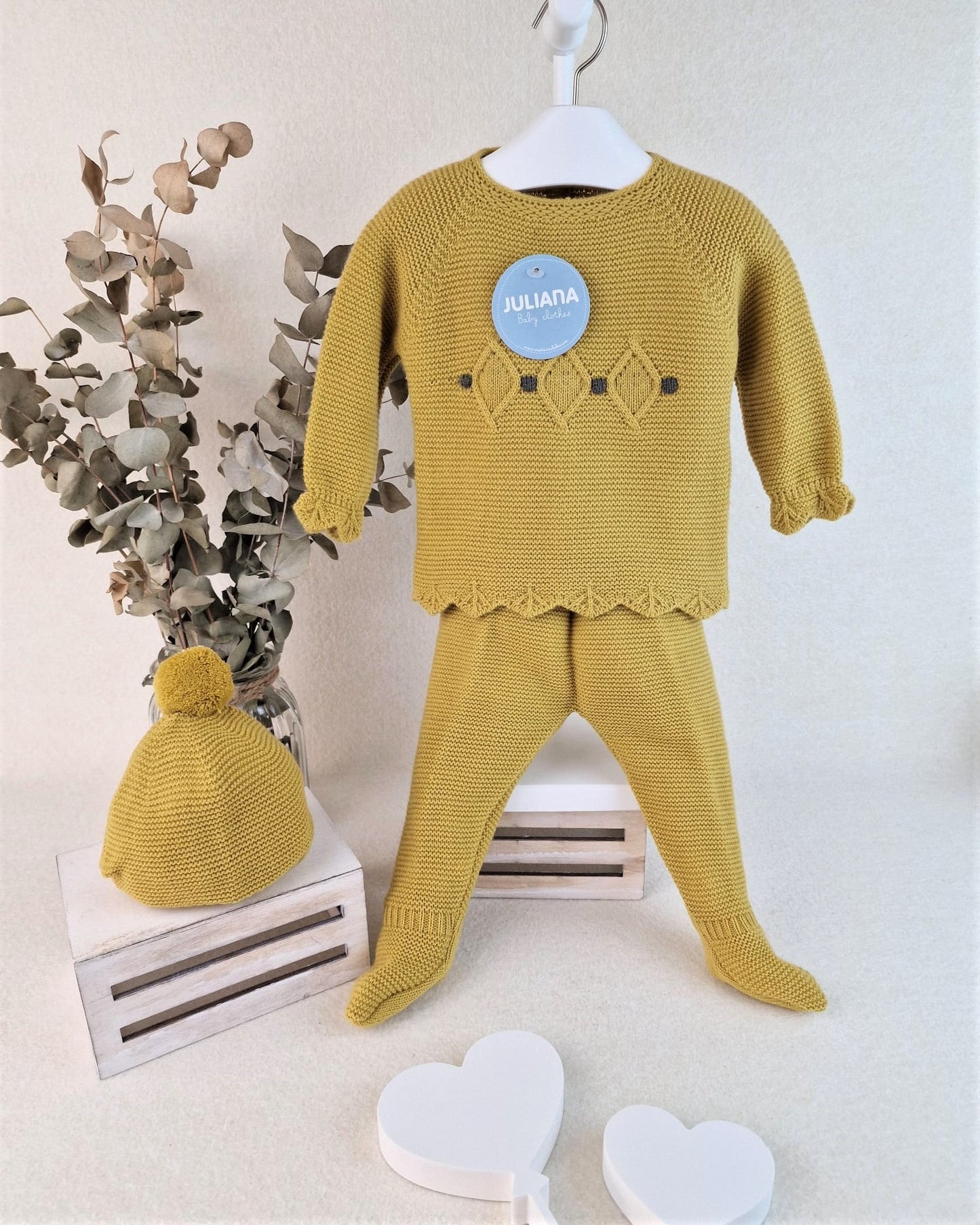 Conjunto con polaina y capota con rombos y bodoques