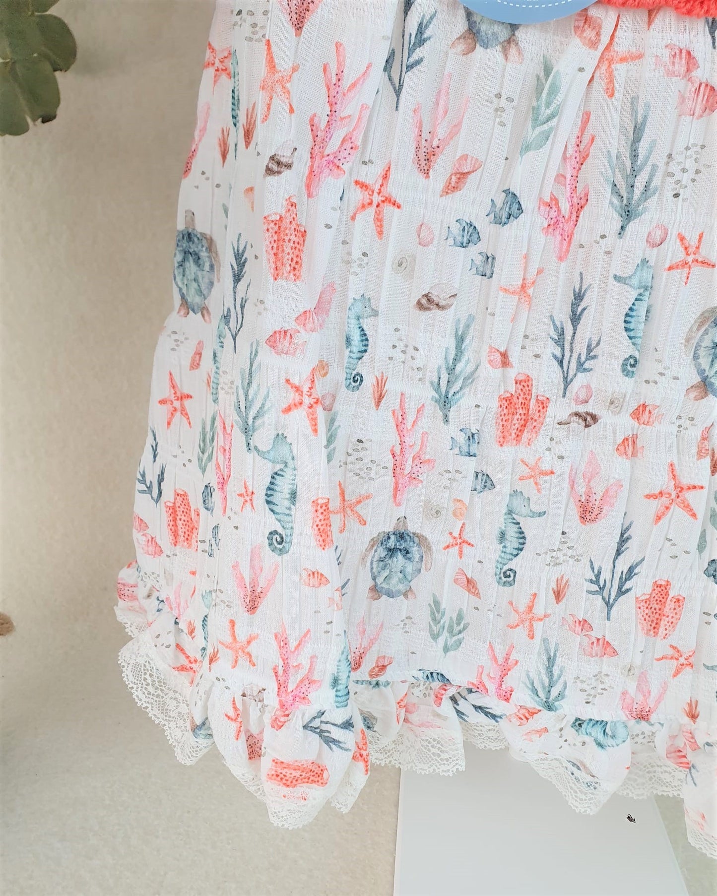 Vestido cuerpo de punto con tela de caballitos de mar