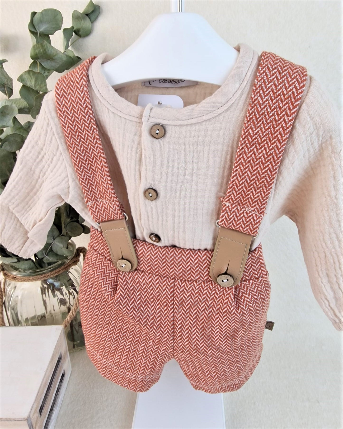 Conjunto con peto Orbis