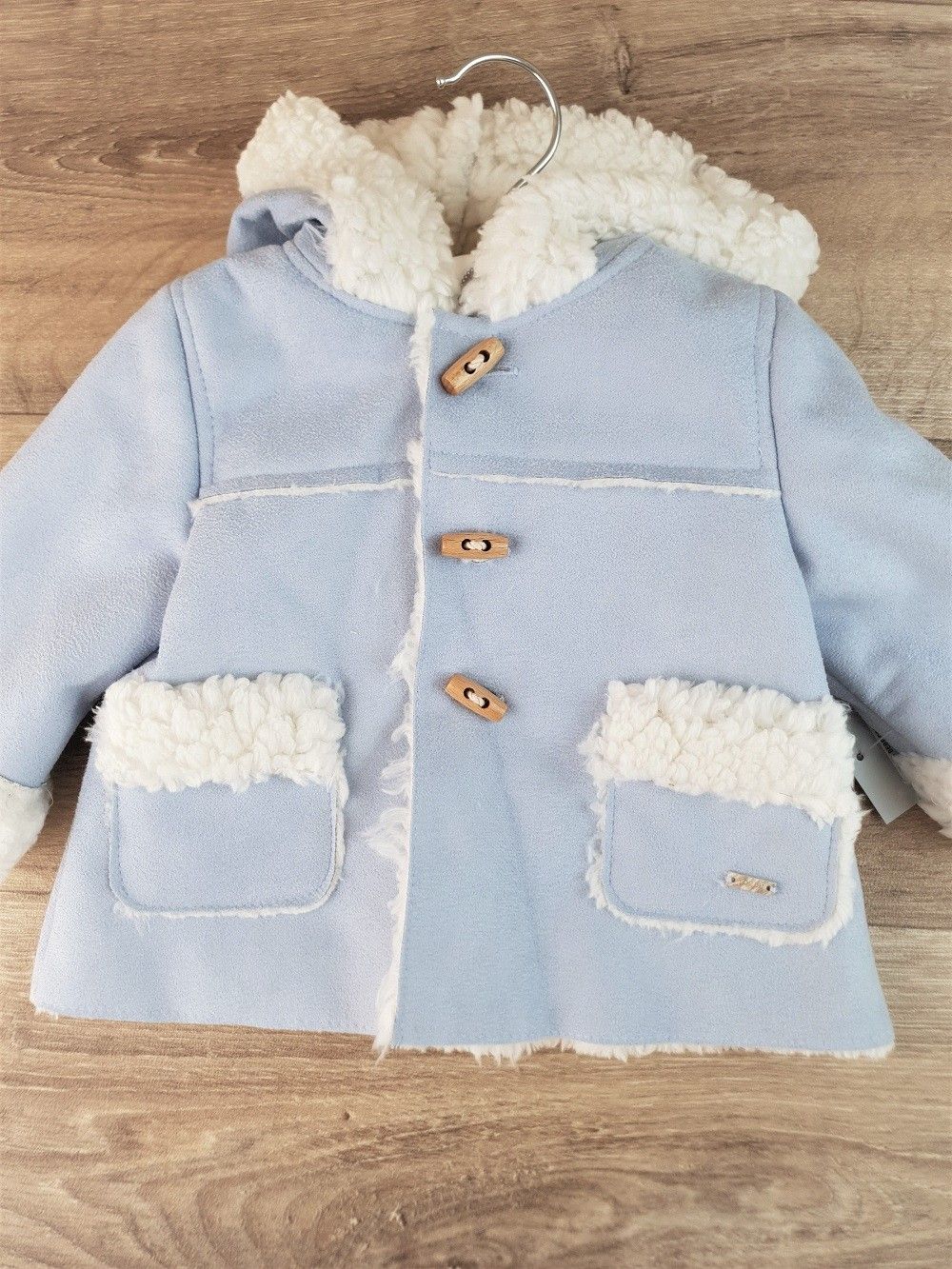 Abrigo bebé con capucha unisex