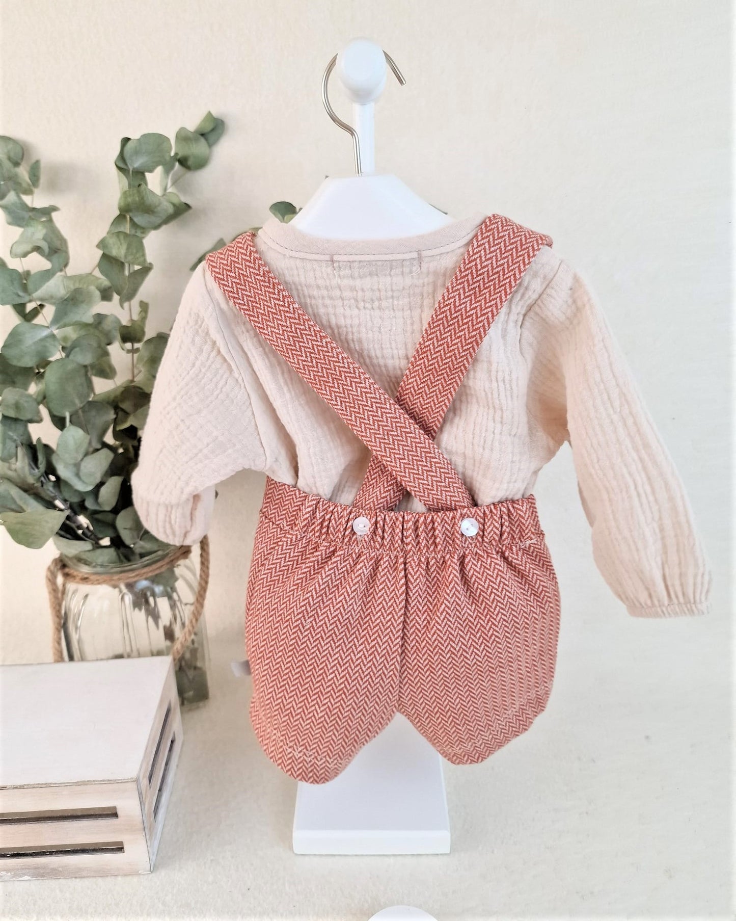 Conjunto con peto Orbis
