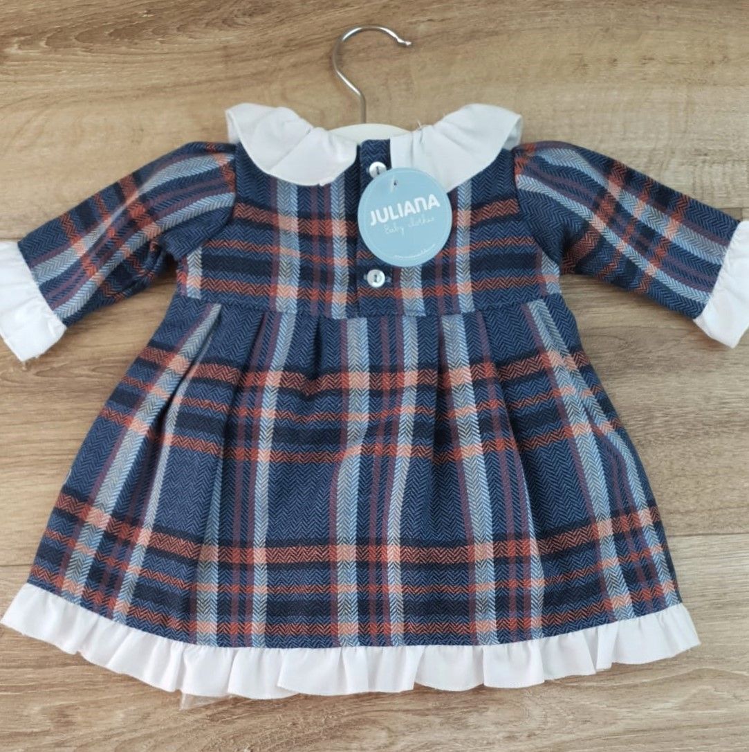Vestido enterizo cuadros y volantes de tela
